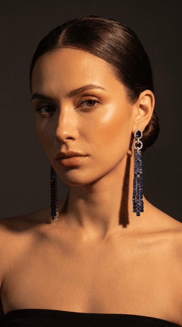 Sapphire chandelier earrings on model